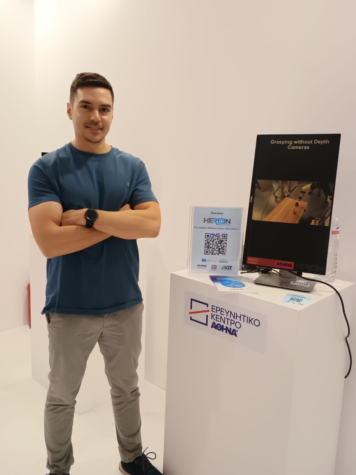 HERON researcher Nikos Kardaris showcasing the interactive demo “Robots with Human-Like Perception: From Vision to Interaction.” at TIF 2026.