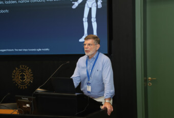 Prof. E. Papadopoulos presented key research directions in legged robotics, highlighting the challenges and opportunities towards agile robotic mobility.