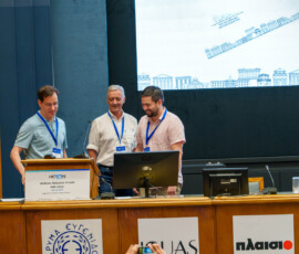 Prof. Iasonas Kokkinos and Prof. Panos Trahanias, members of the HRF Awards Committee, presenting one of the Best Paper Awards at HRF 2026.